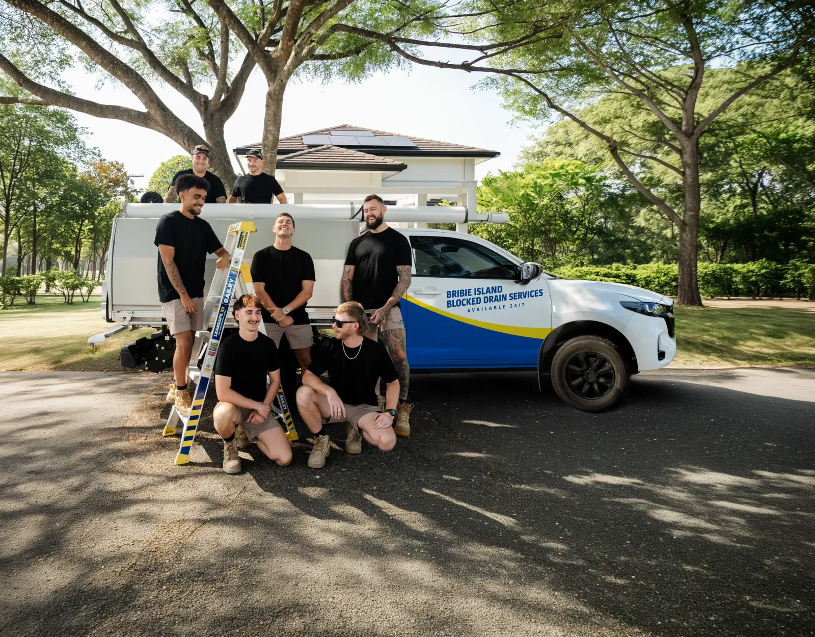 Bribie Island Blocked Drain Services ute and team